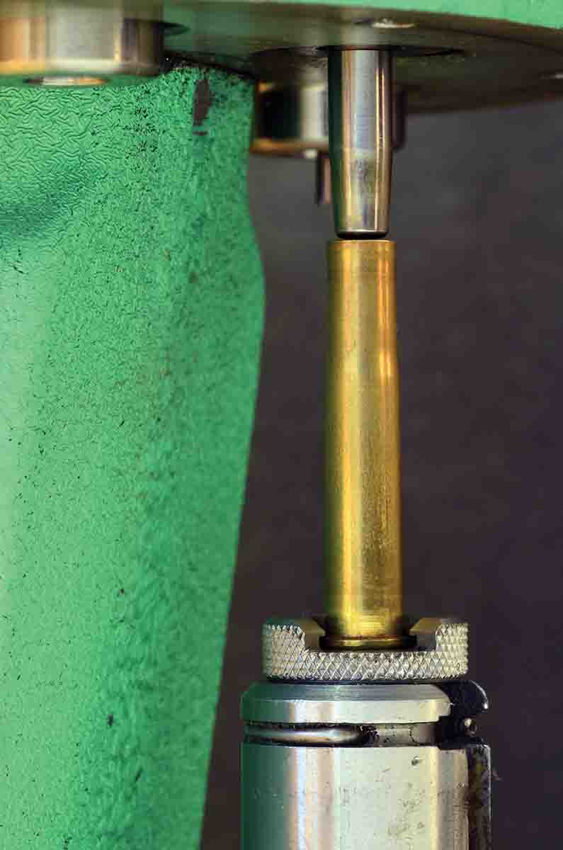 A K&M neck-sizing iron is used to open a crimped neck. The mandrels are available in different sizes to accommodate a range of calibers.
